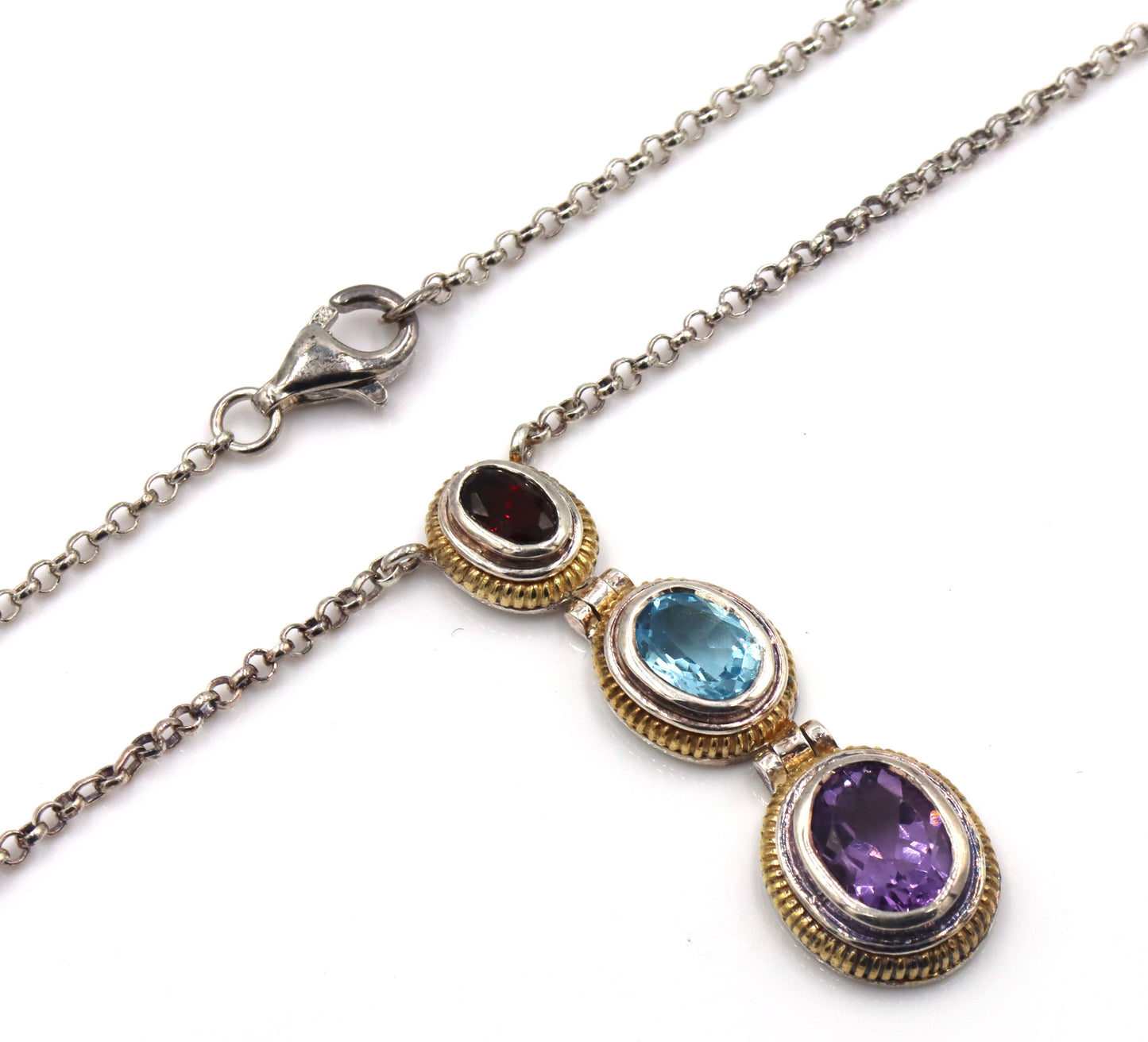 925 Sterling silver signed amethyst, blue topaz and garnet pendant on chain