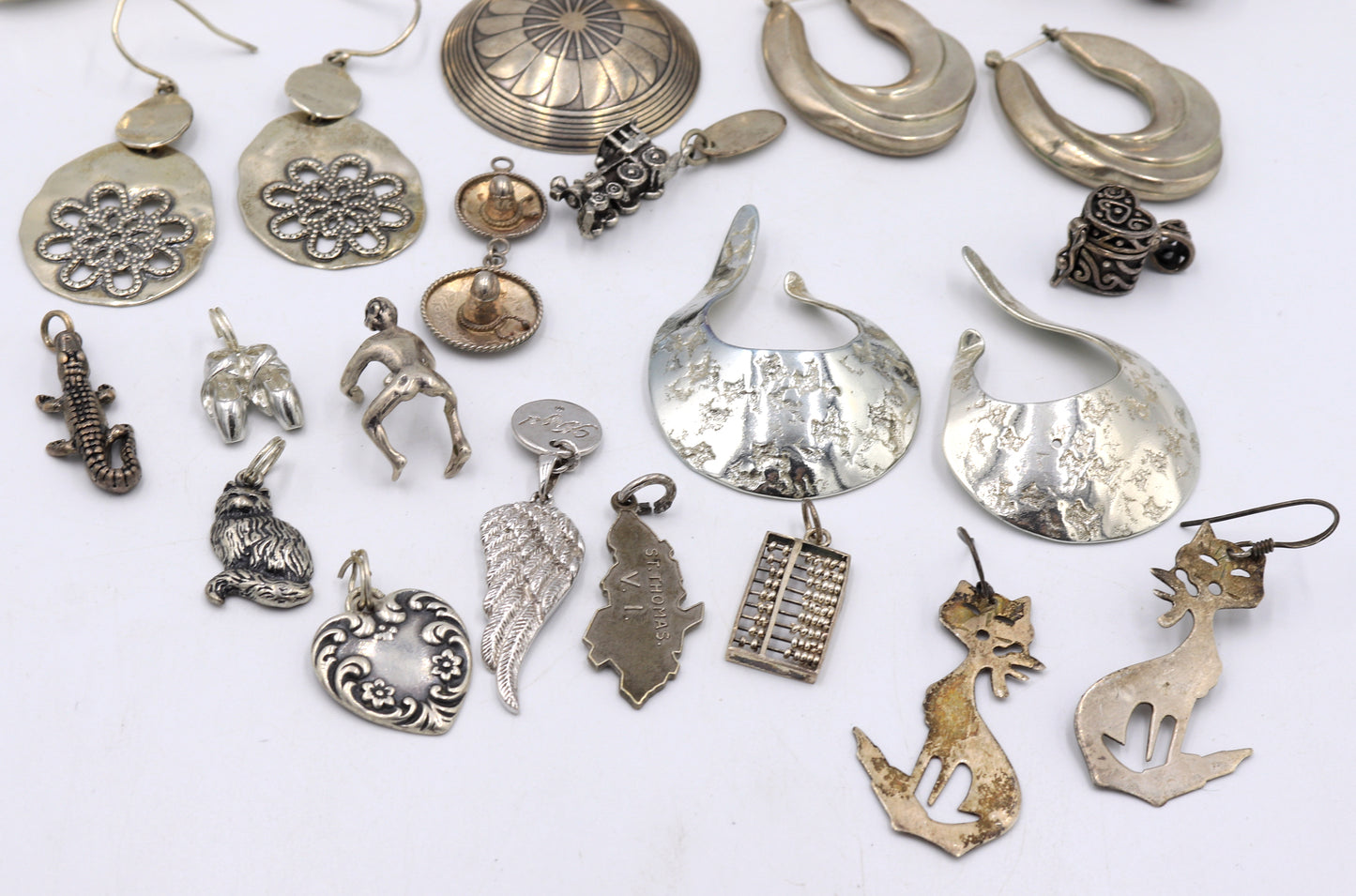 Group lot of Vintage 925 sterling silver charms and earrings