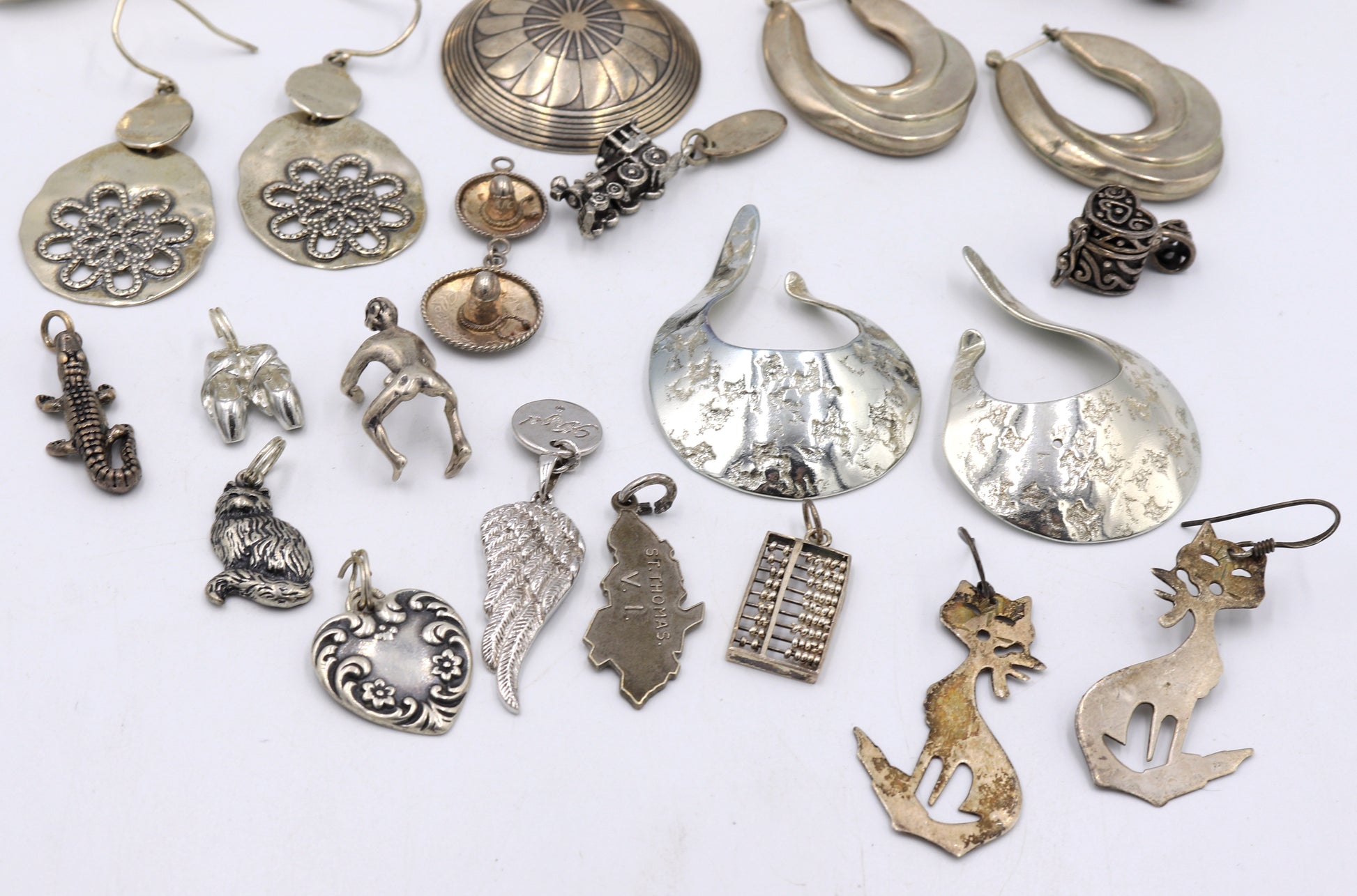 Group lot of Vintage 925 sterling silver charms and earrings