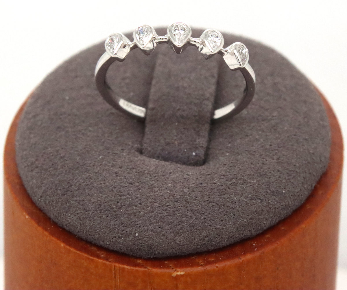 14kt White gold pear shaped bezel set diamond ring