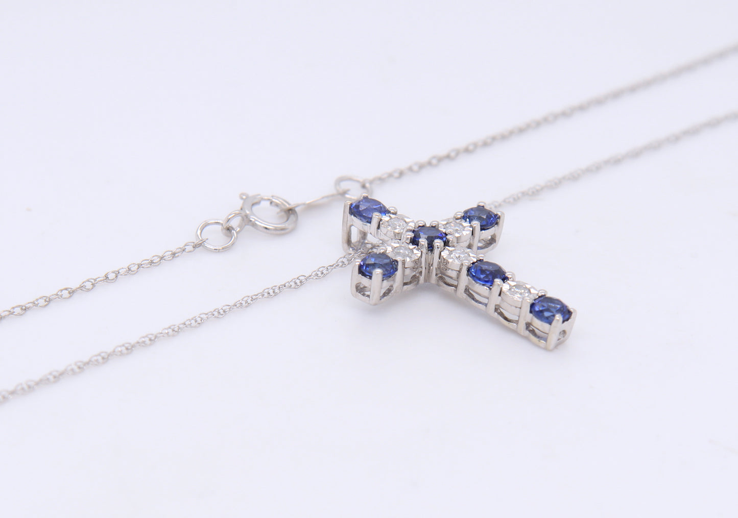 Fantastic White Gold Sapphire and Diamond accent Cross Pendant on Chain