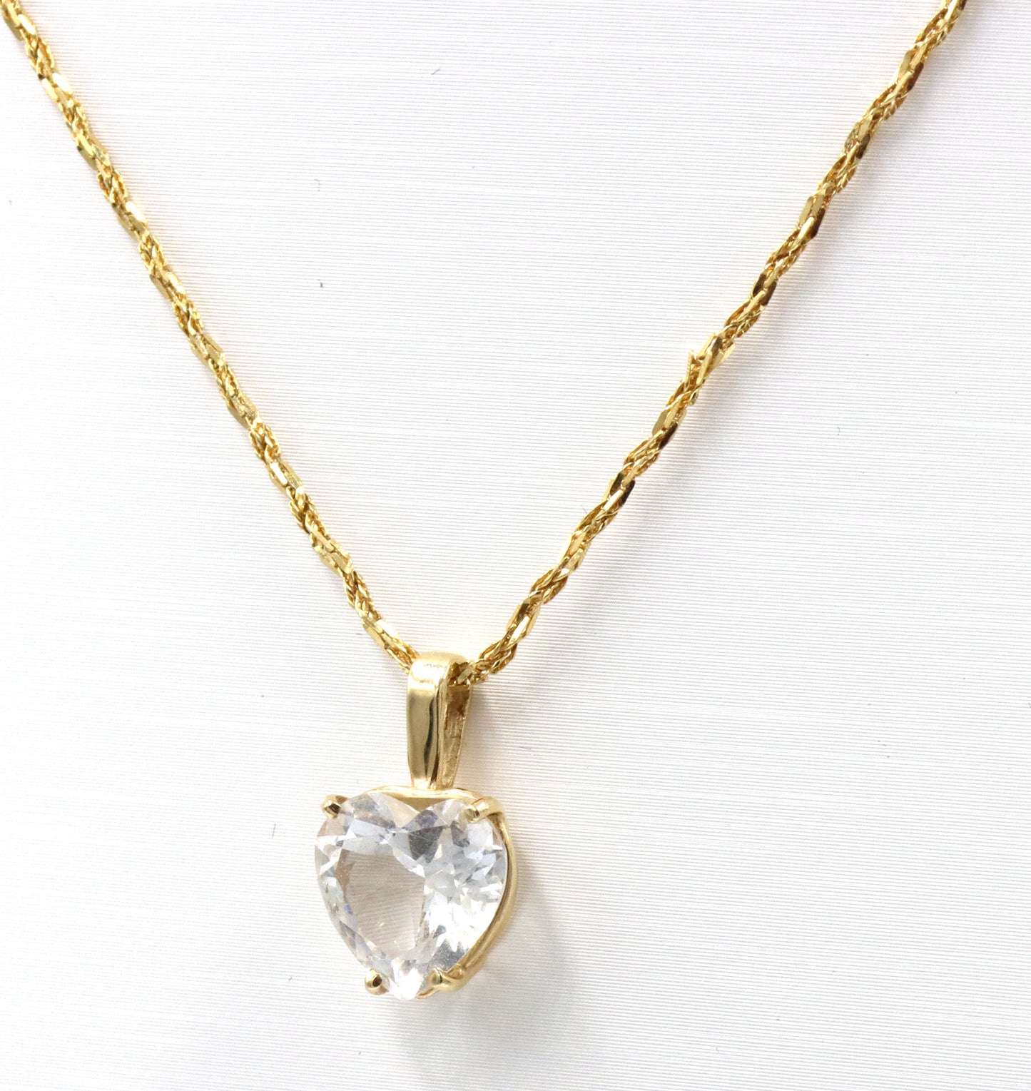 14kt Yellow gold cubic zirconia heart shaped pendant on chain