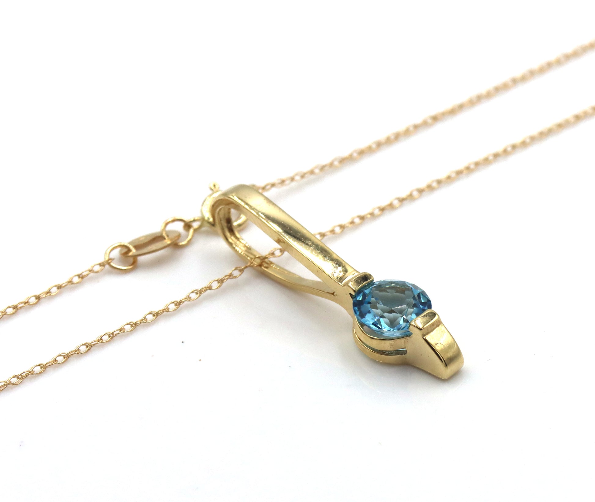 14kt Yellow gold blue topaz bar pendant on chain