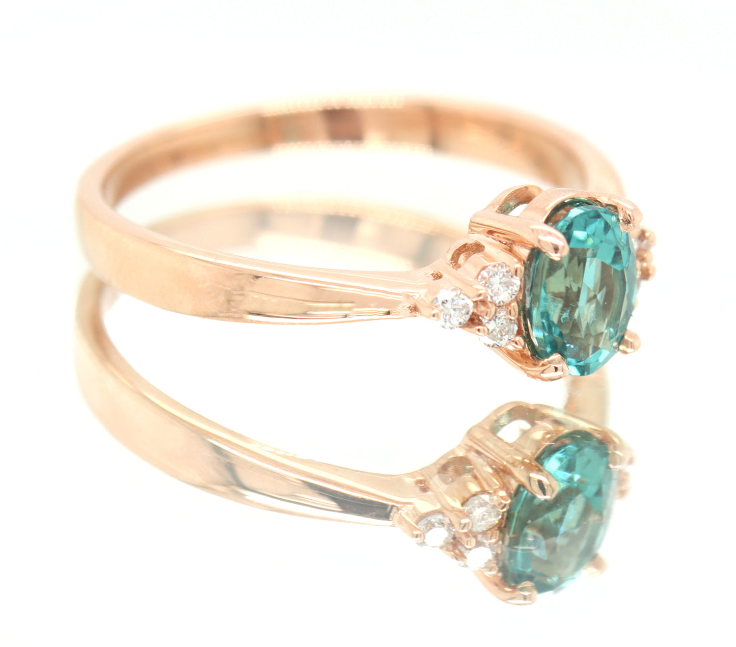 14kt Rose Gold oval Blue Zircona and Diamond Ring