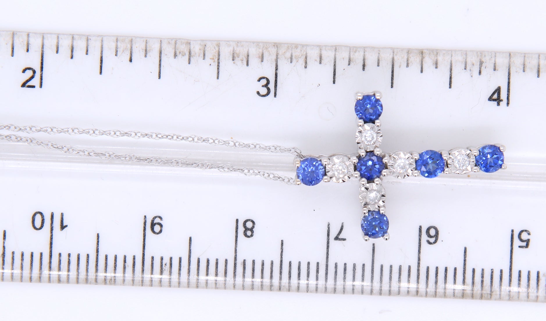 Fantastic White Gold Sapphire and Diamond accent Cross Pendant on Chain