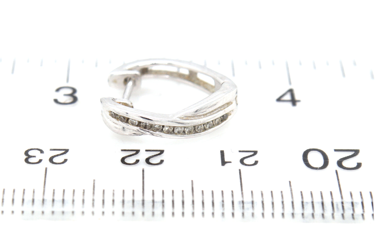 10kt White gold diamond crossover hoop earrings