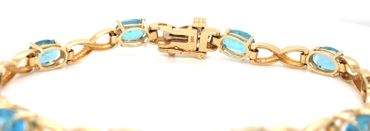 14kt Yellow gold oval blue topaz bracelet