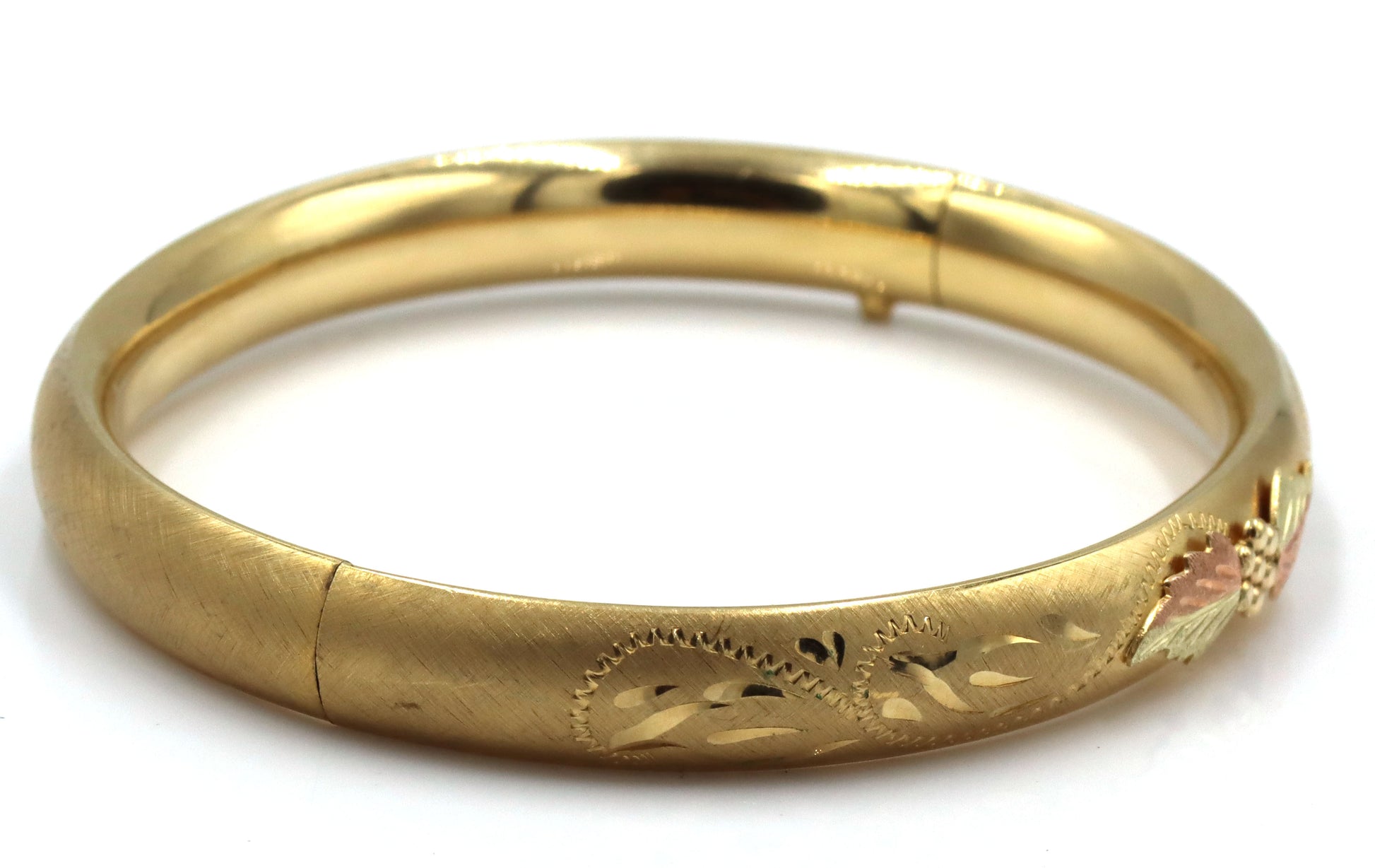 Gold plated flower engraved bangle bracelet