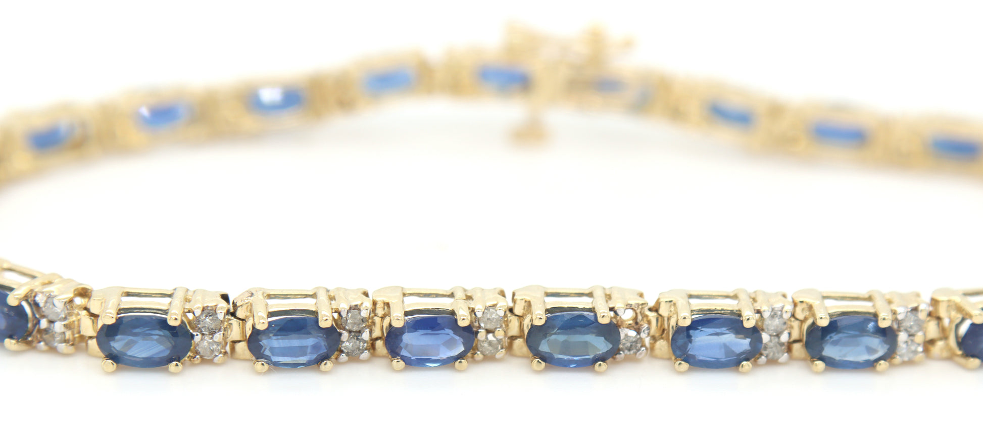 14kt Yellow gold blue sapphire and diamond tennis bracelet