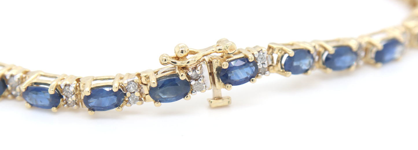 14kt Yellow gold blue sapphire and diamond tennis bracelet