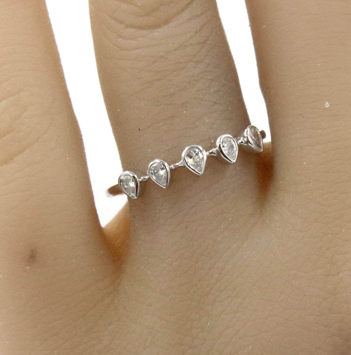 14kt White gold pear shaped bezel set diamond ring