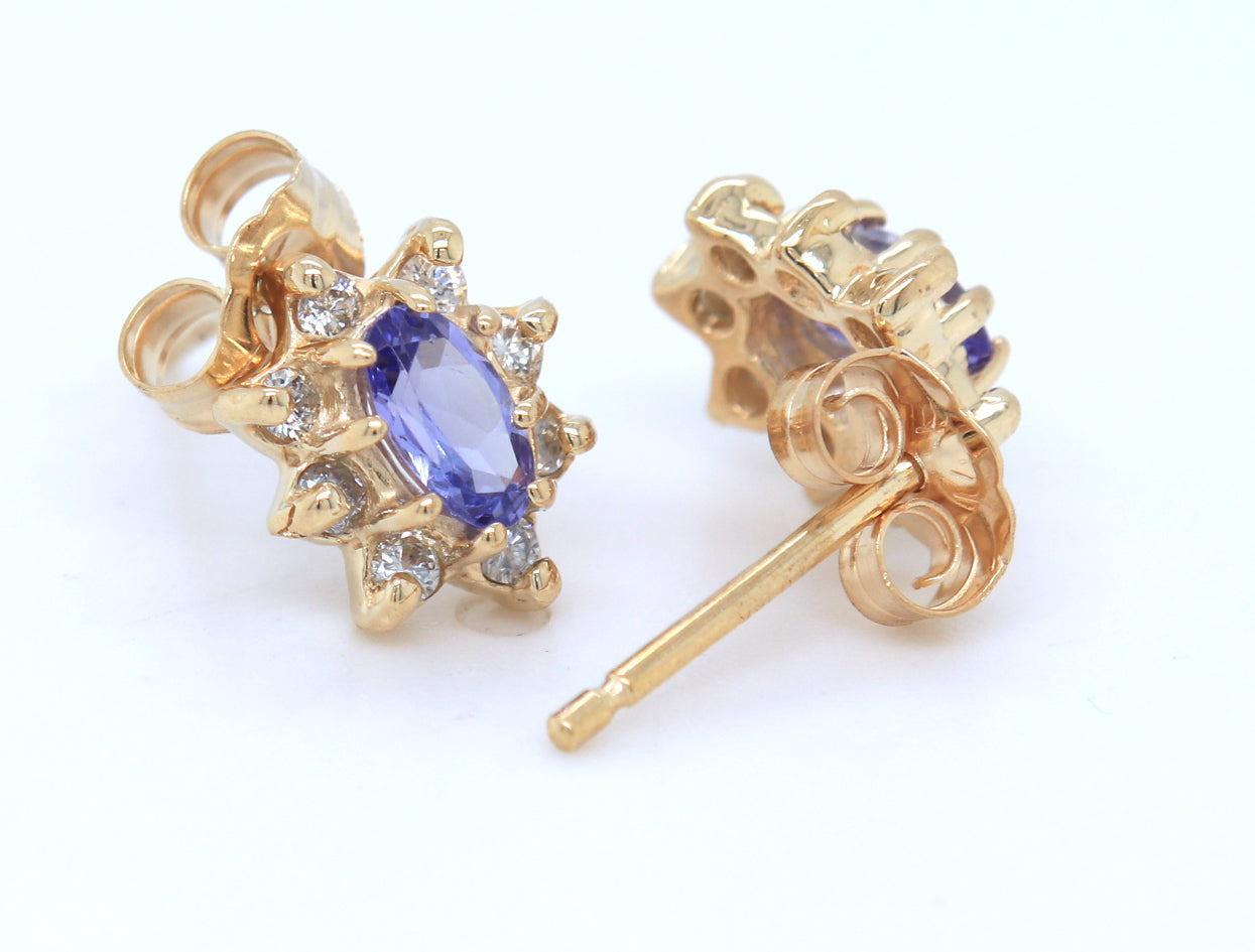 14kt Yellow gold oval Tanzanite and diamond flower earrings