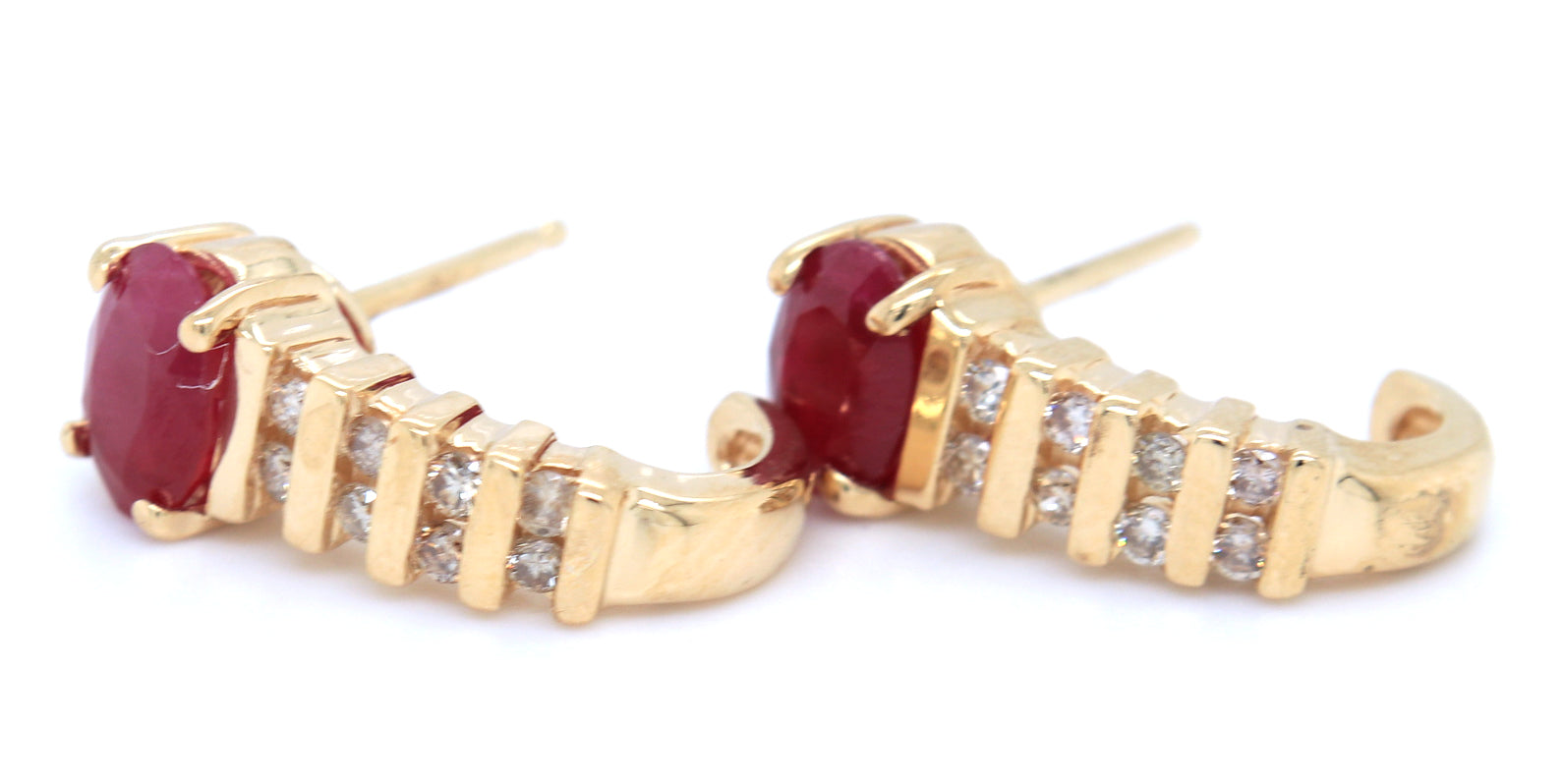14kt Yellow gold oval ruby and diamond accent earrings