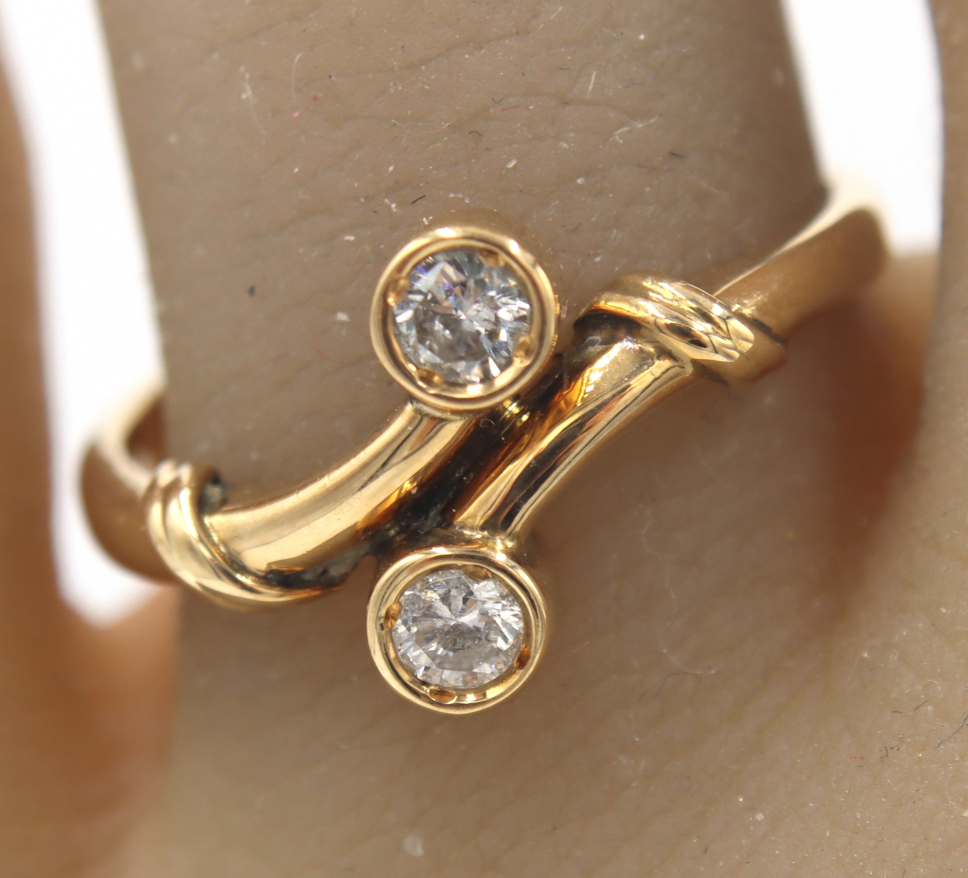 14kt Yellow gold diamond bypass ring