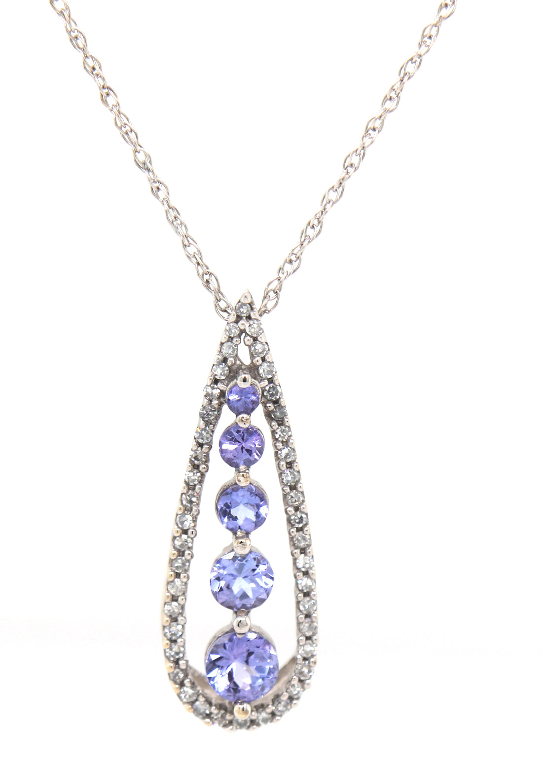 14kt White gold Tanzanite and diamond pendant on chain