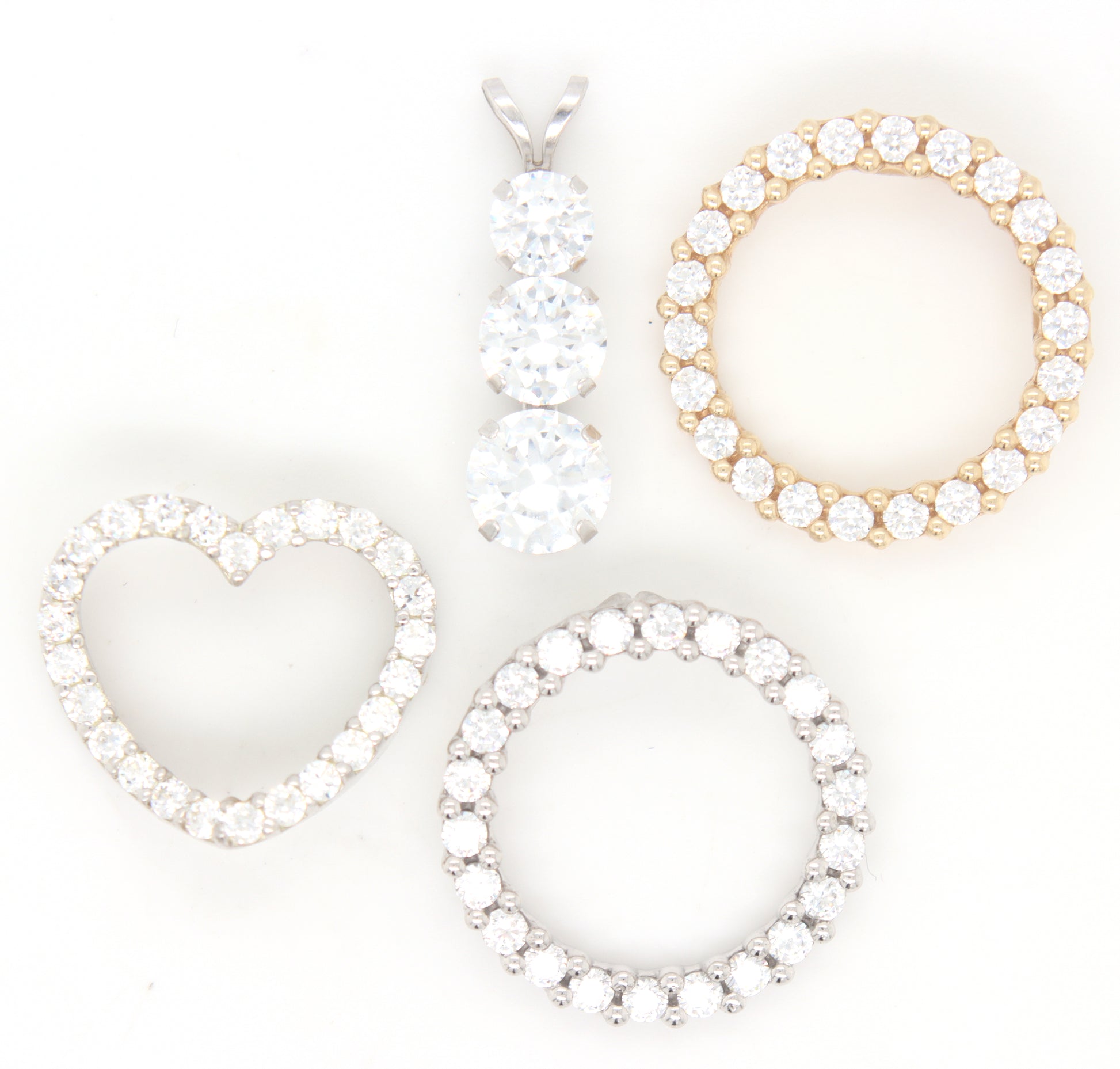 Group lot of 4 cubic zirconia pendants in 14kt