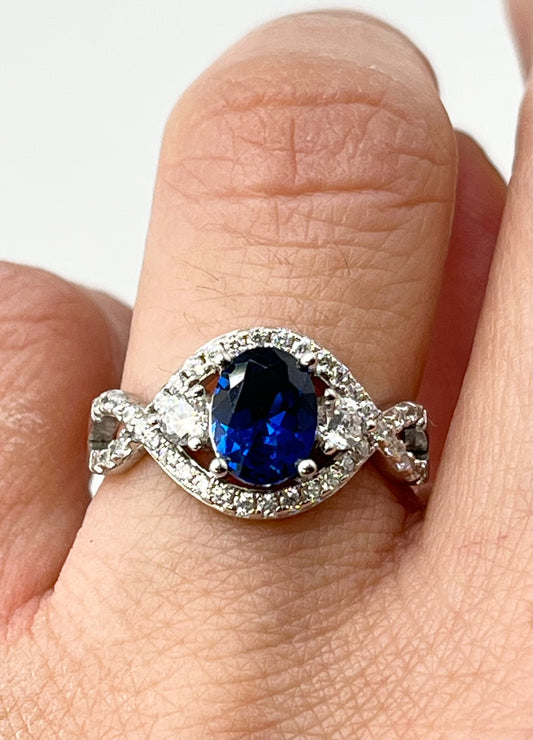 925 Sterling Silver Oval Blue Center Stone With Crystal Pave Details Ring