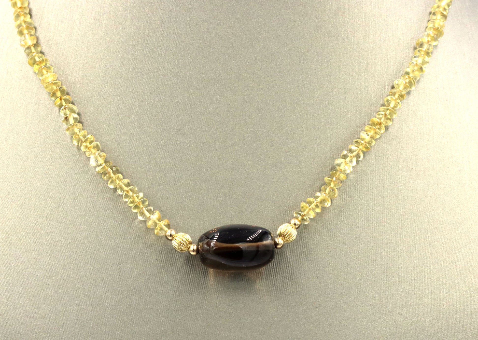 Smokey quartz pendant on citirne beaded necklace with 14kt yellow gold clasp