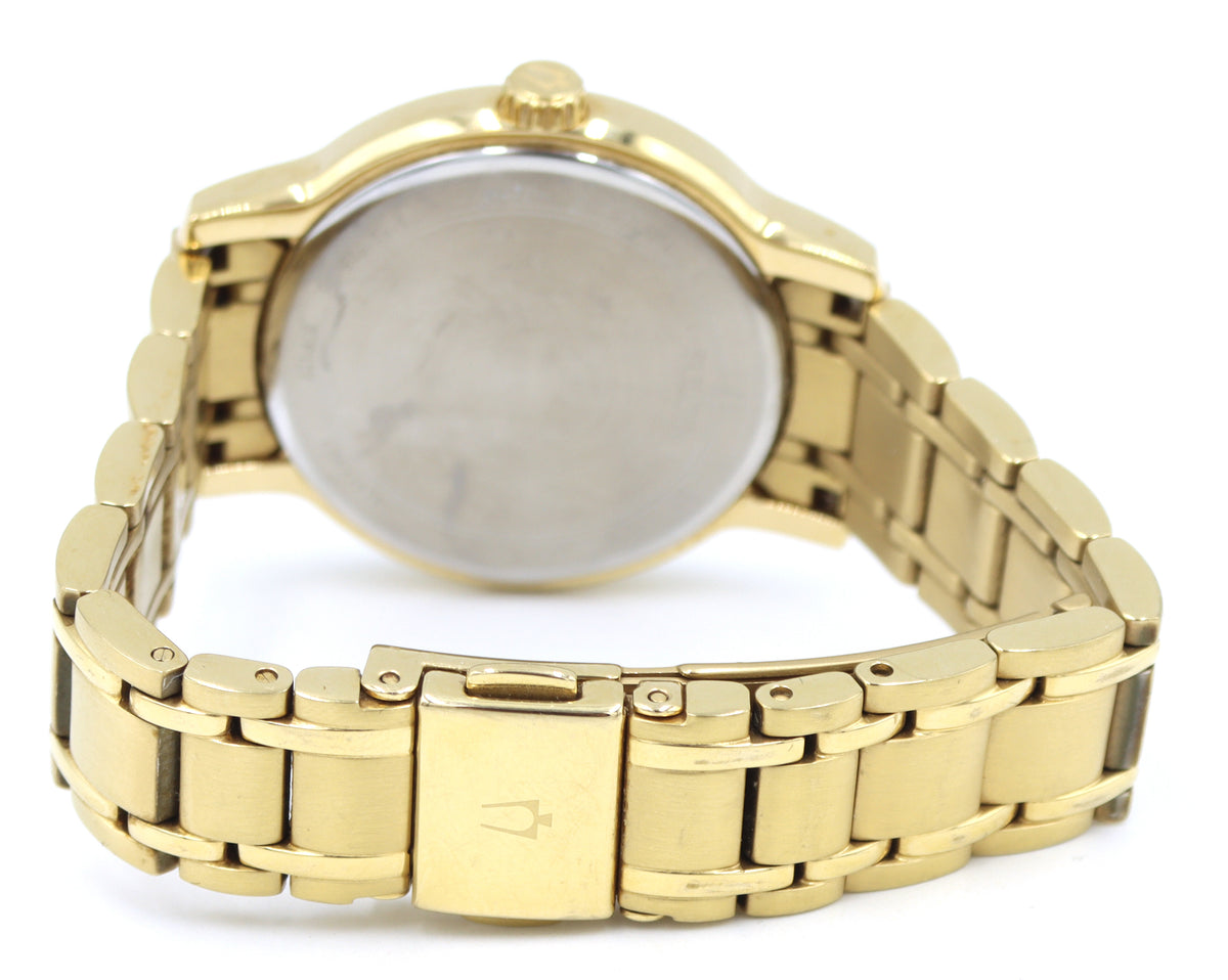 Bulova gold tone quartz round  watch