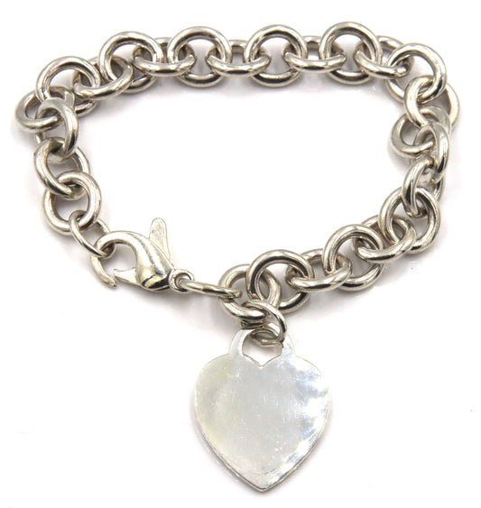 Tiffany & Co link bracelet with heart shaped charm