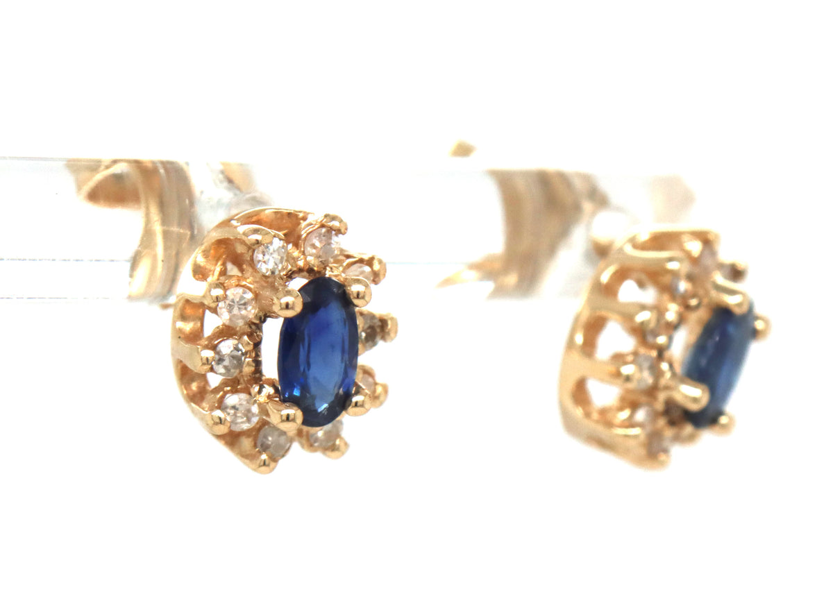 14kt Yellow gold oval sapphire and diamond halo earrings