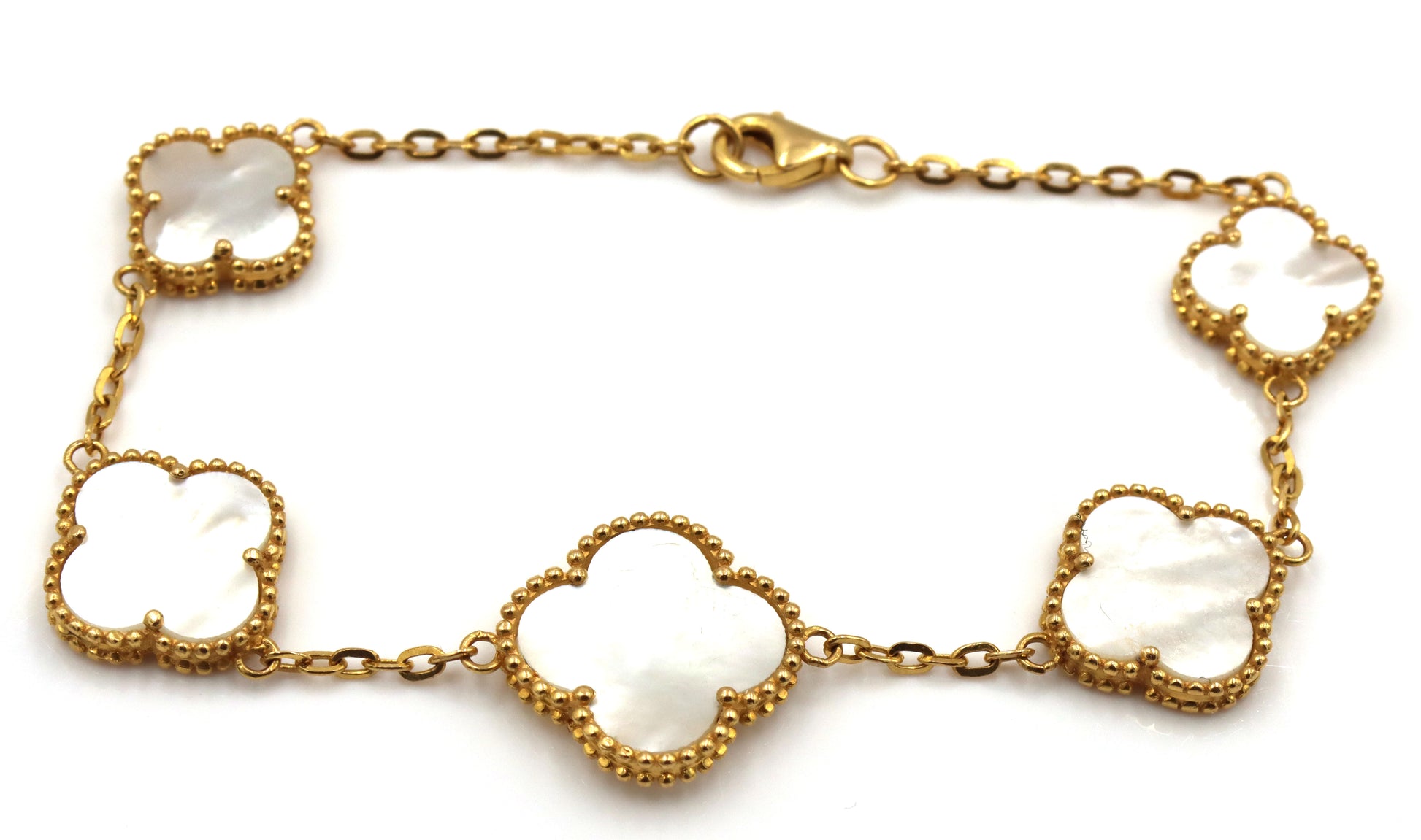 Set of 21kt Yellow gold mother of pearl bracelet and earrings