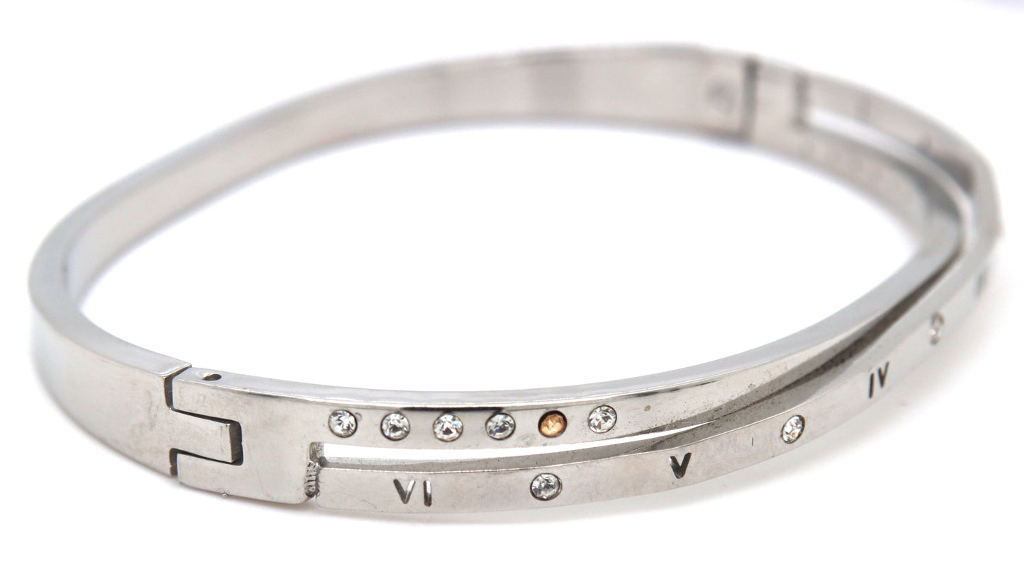 Stainless steel twisted bangle