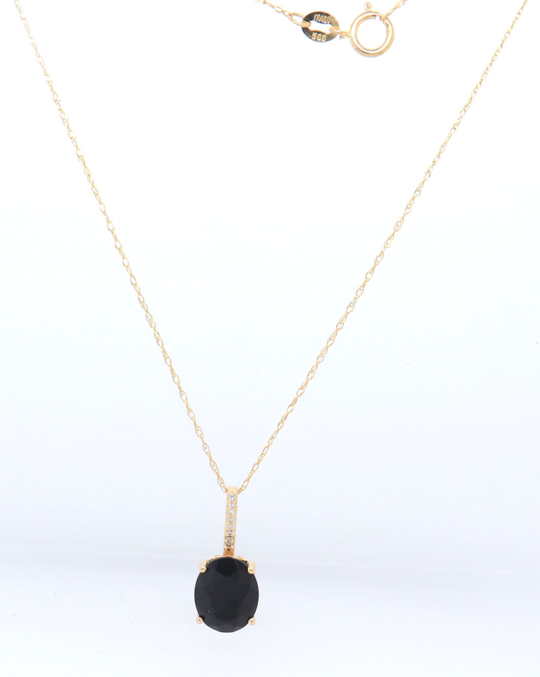 14kt Yellow gold oval black onyx and diamond pendant on chain necklace