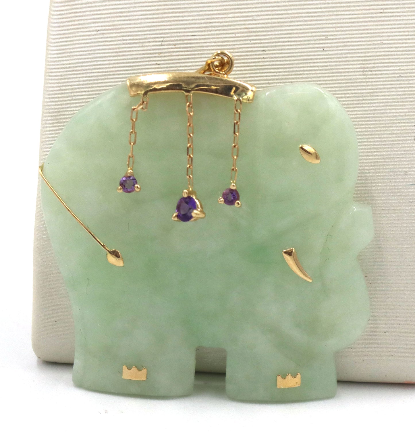 Lot of 14kt yellow gold green jade pendants