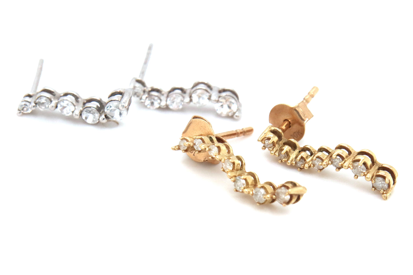 2 Pairs of 10kt diamond earrings