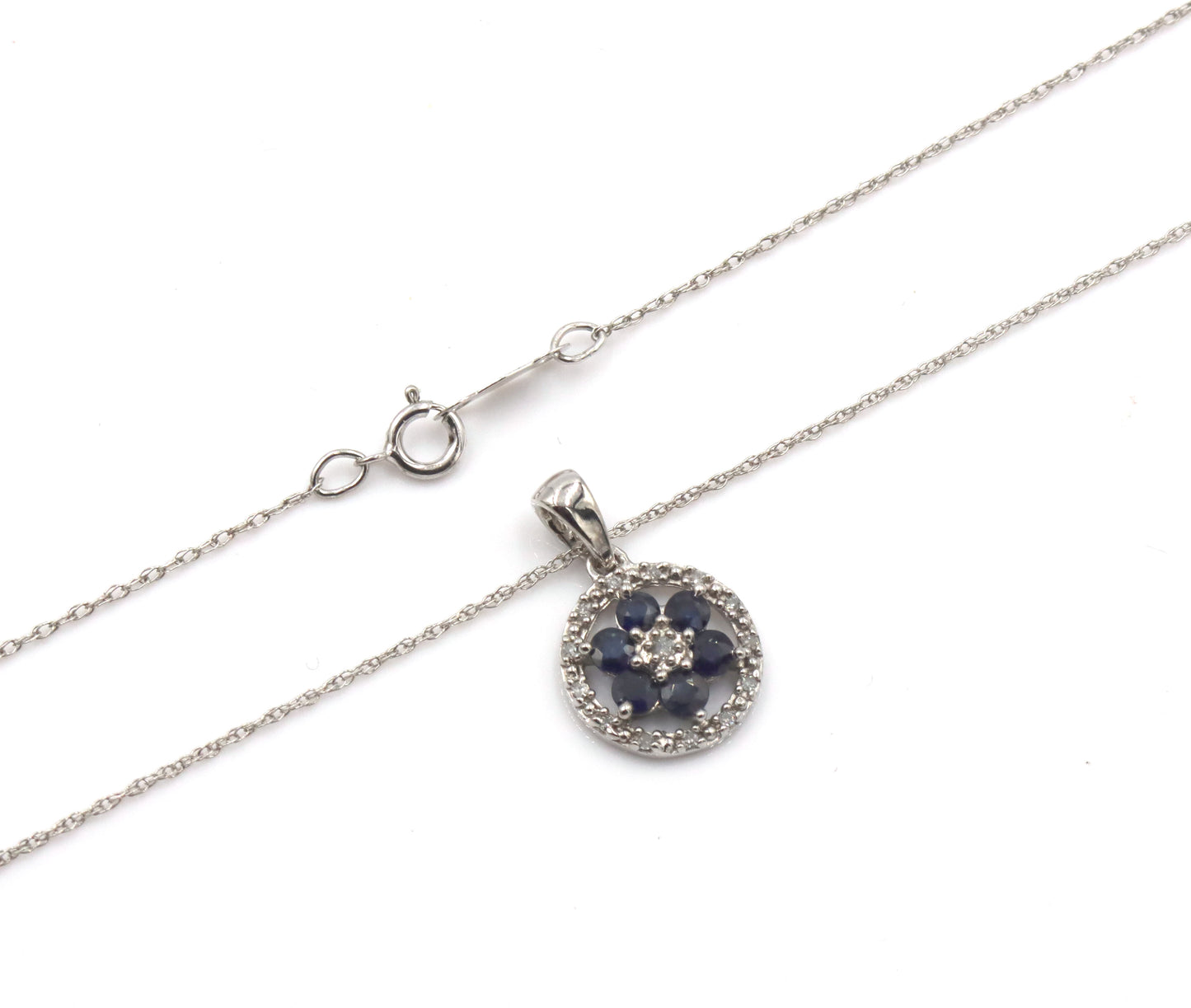 10kt White gold sapphire and diamond halo flower pendant on chain