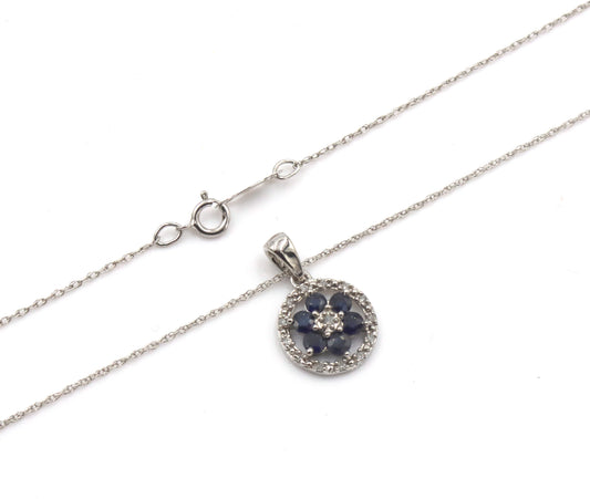 10kt White gold sapphire and diamond halo flower pendant on chain