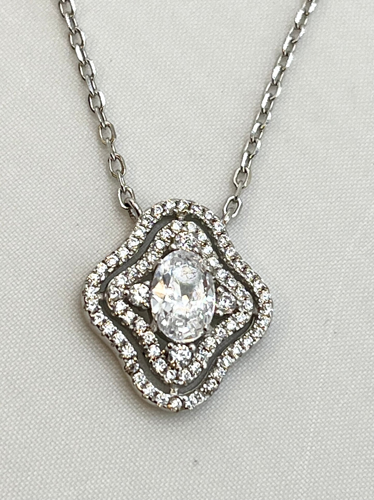 925 Sterling Silver Oval Shape Center Crystal Pendant With Doble Halo Design Necklace