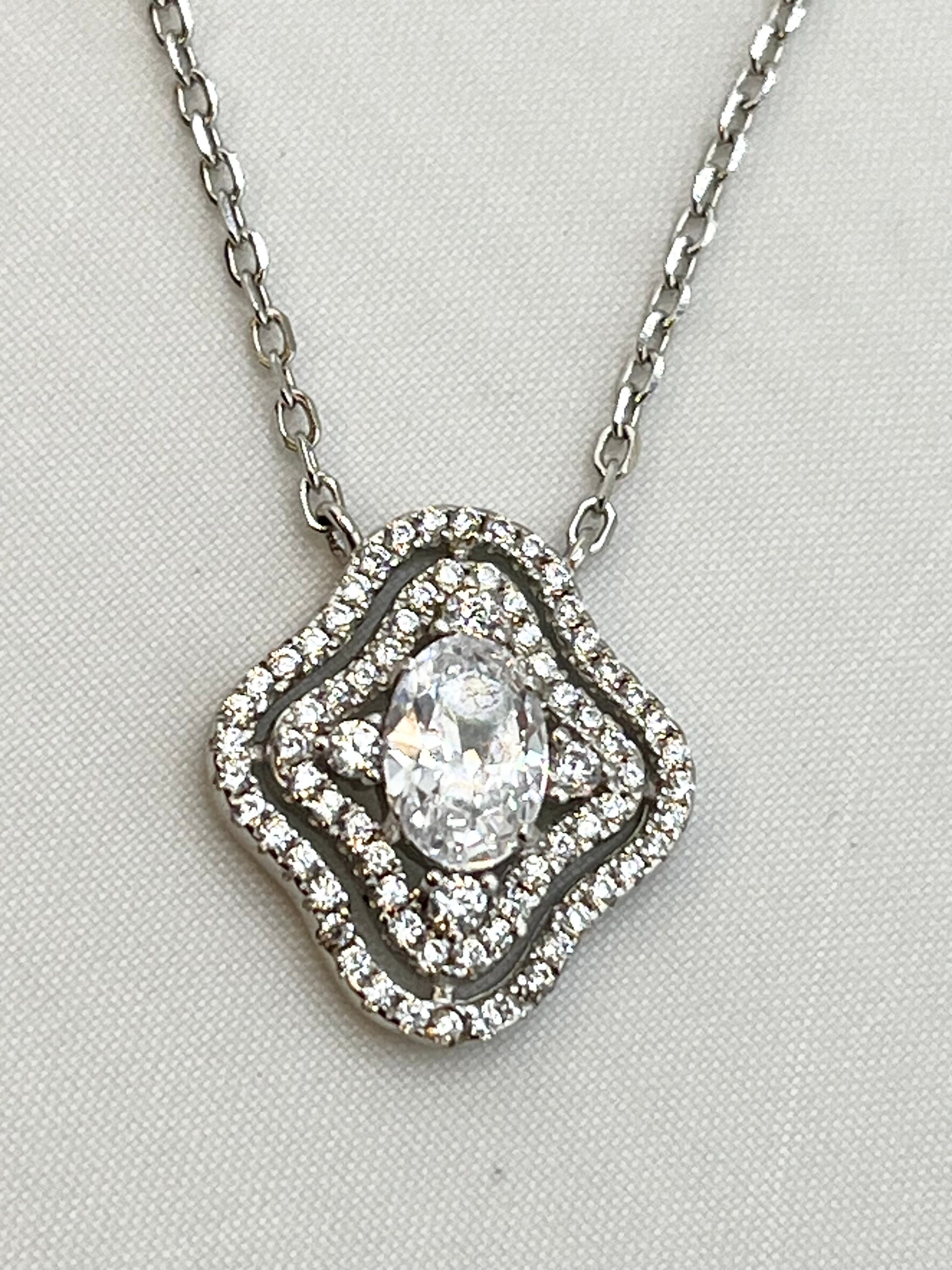 925 Sterling Silver Oval Shape Center Crystal Pendant With Doble Halo Design Necklace