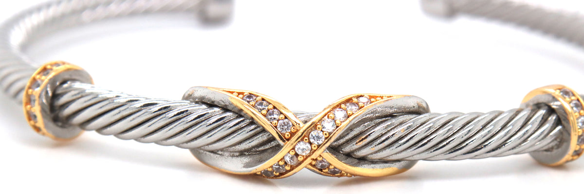 Stainless steel cross over cuff bangle