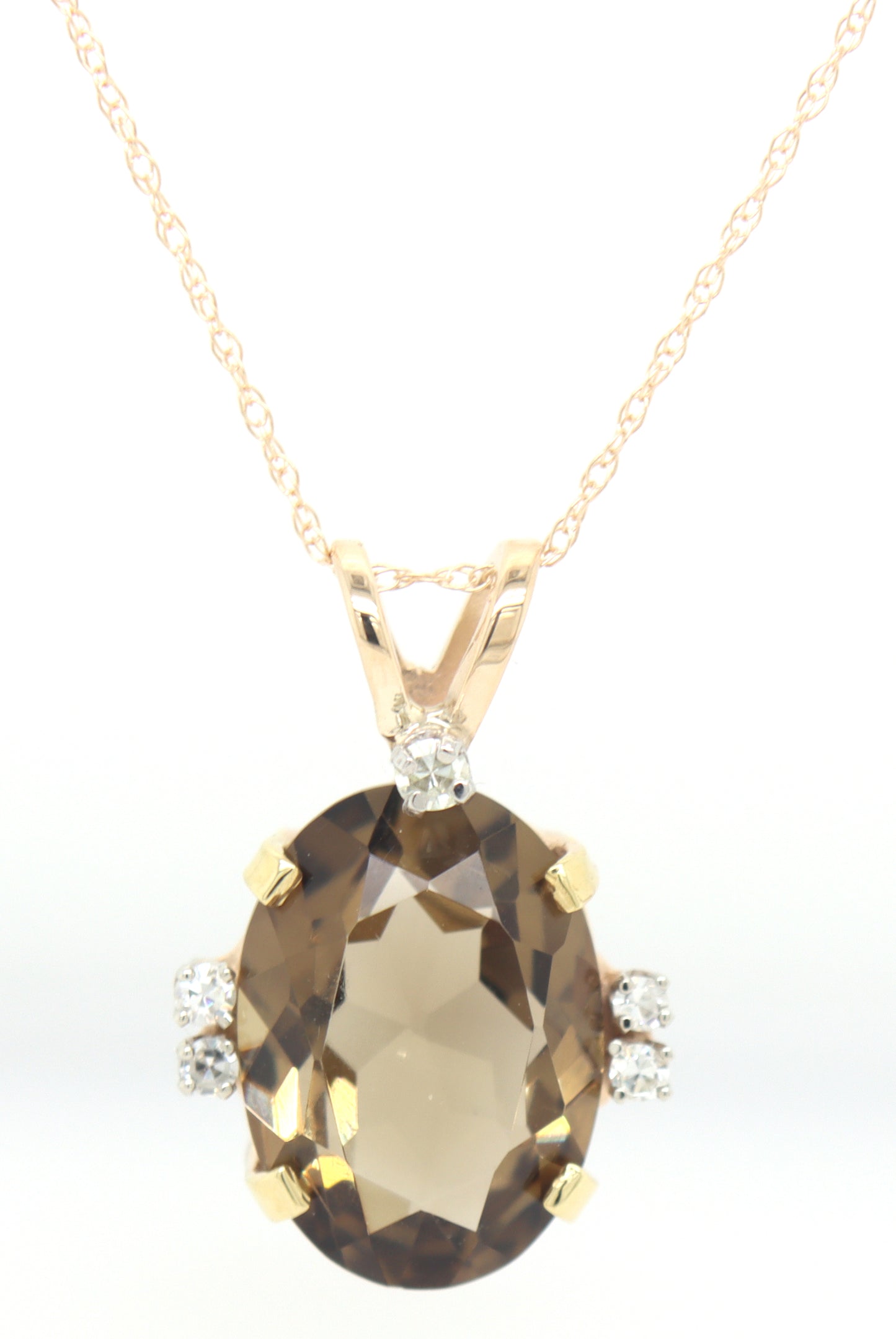 14kt Yellow gold Oval smokey quartz and diamond pendant on chain