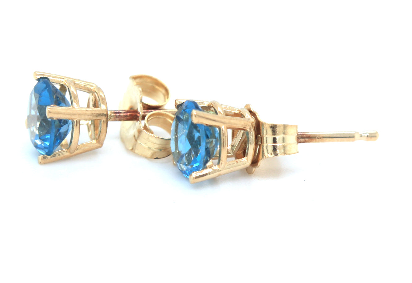 14kt Yellow gold 1.20ctw blue topaz stud earrings