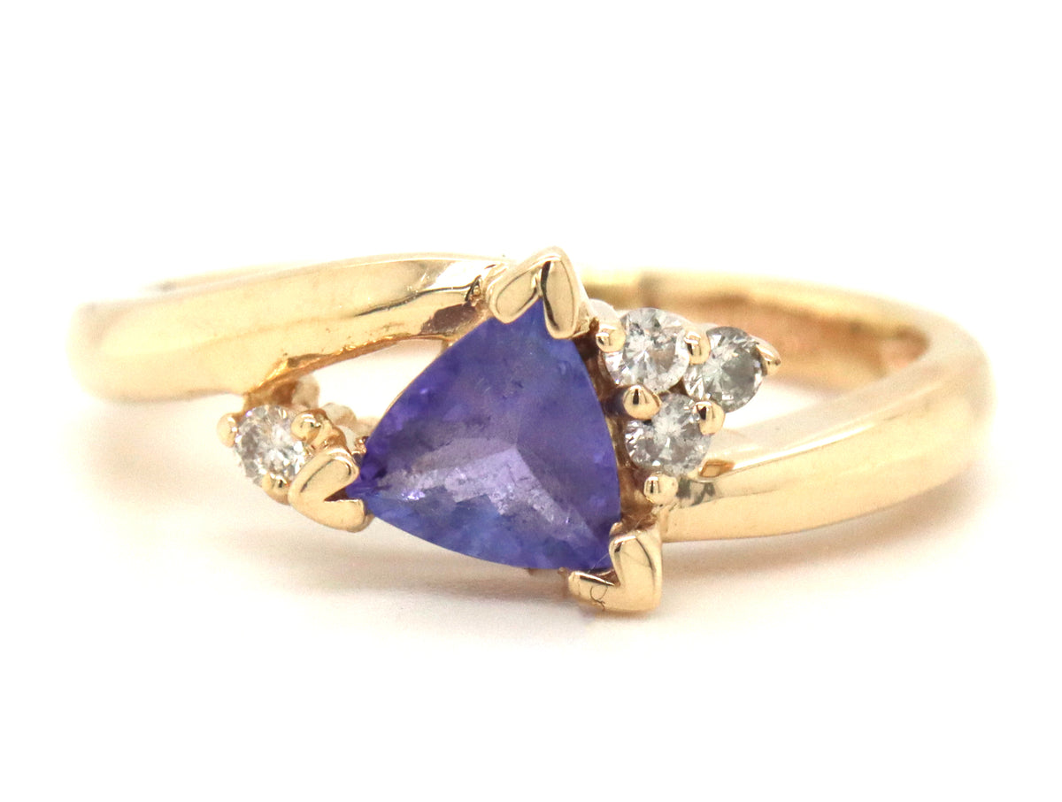 14kt Yellow gold trillion Tanzanite and diamond accent bypass ring