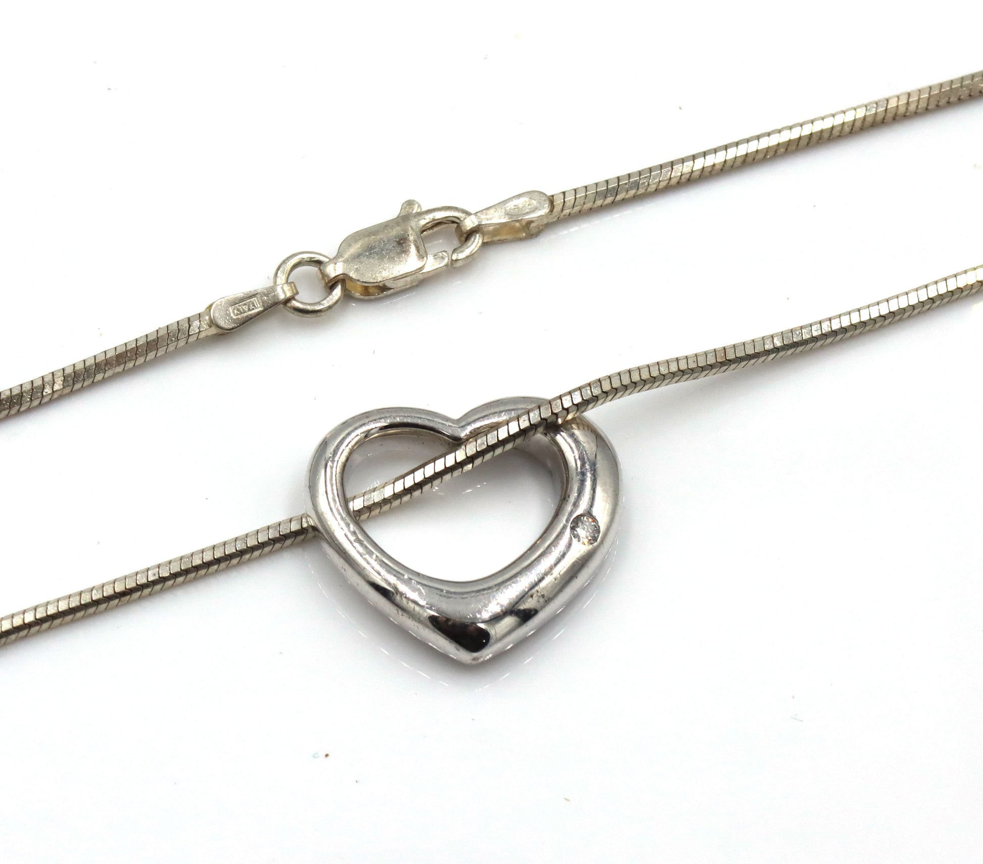 Set of 925 sterling silver 2 necklaces and 2 pair of earrings