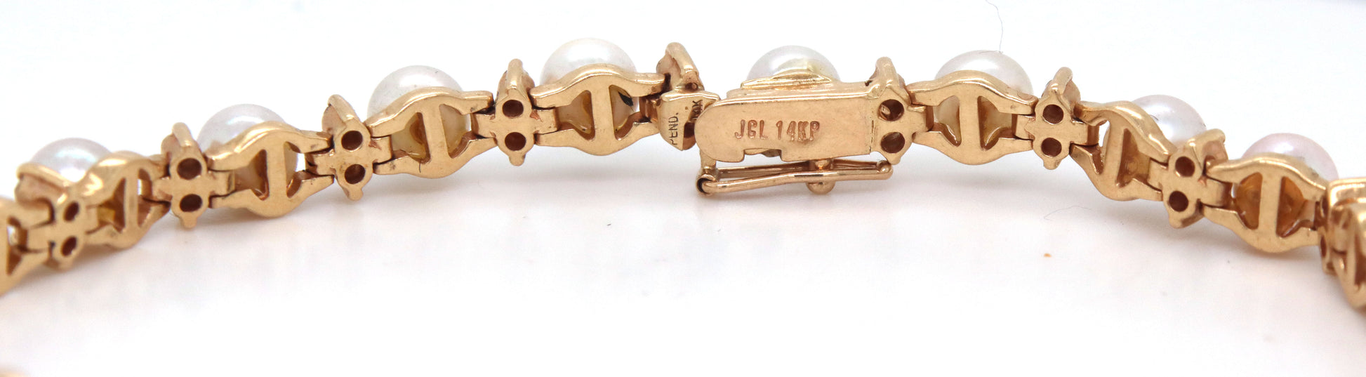 14kt Yellow gold pearl and diamond link bracelet