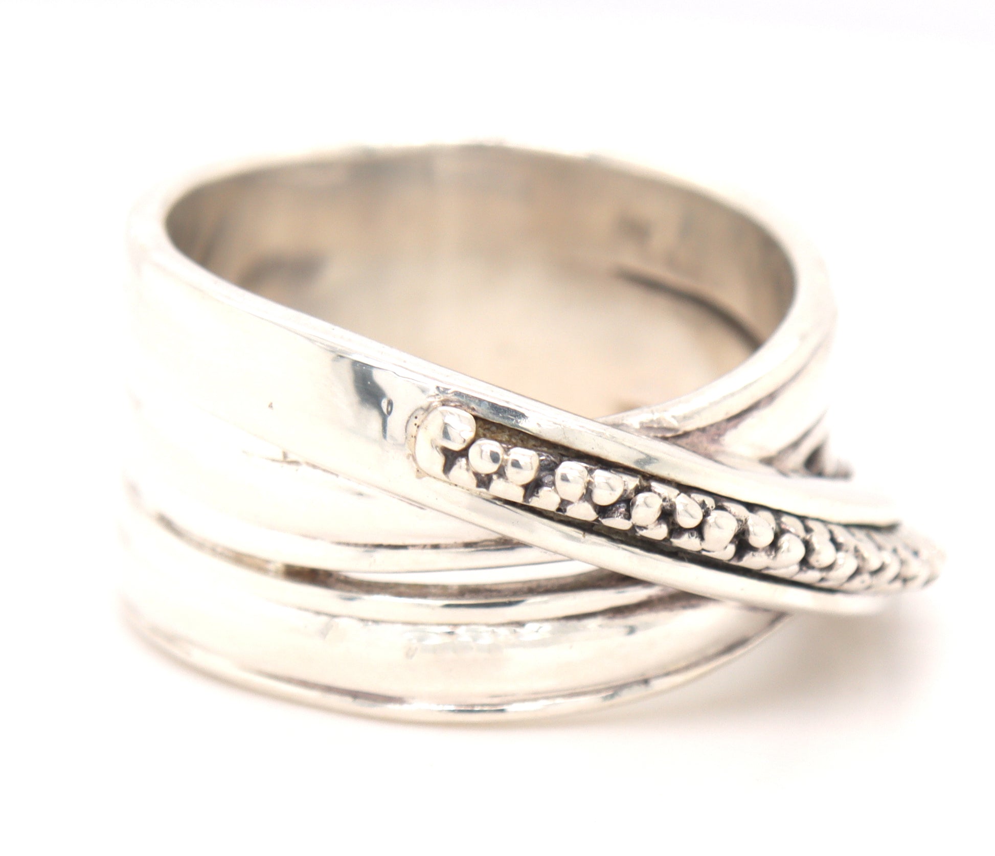 Michael Dawkins bead cross over ring in 925 sterling silver