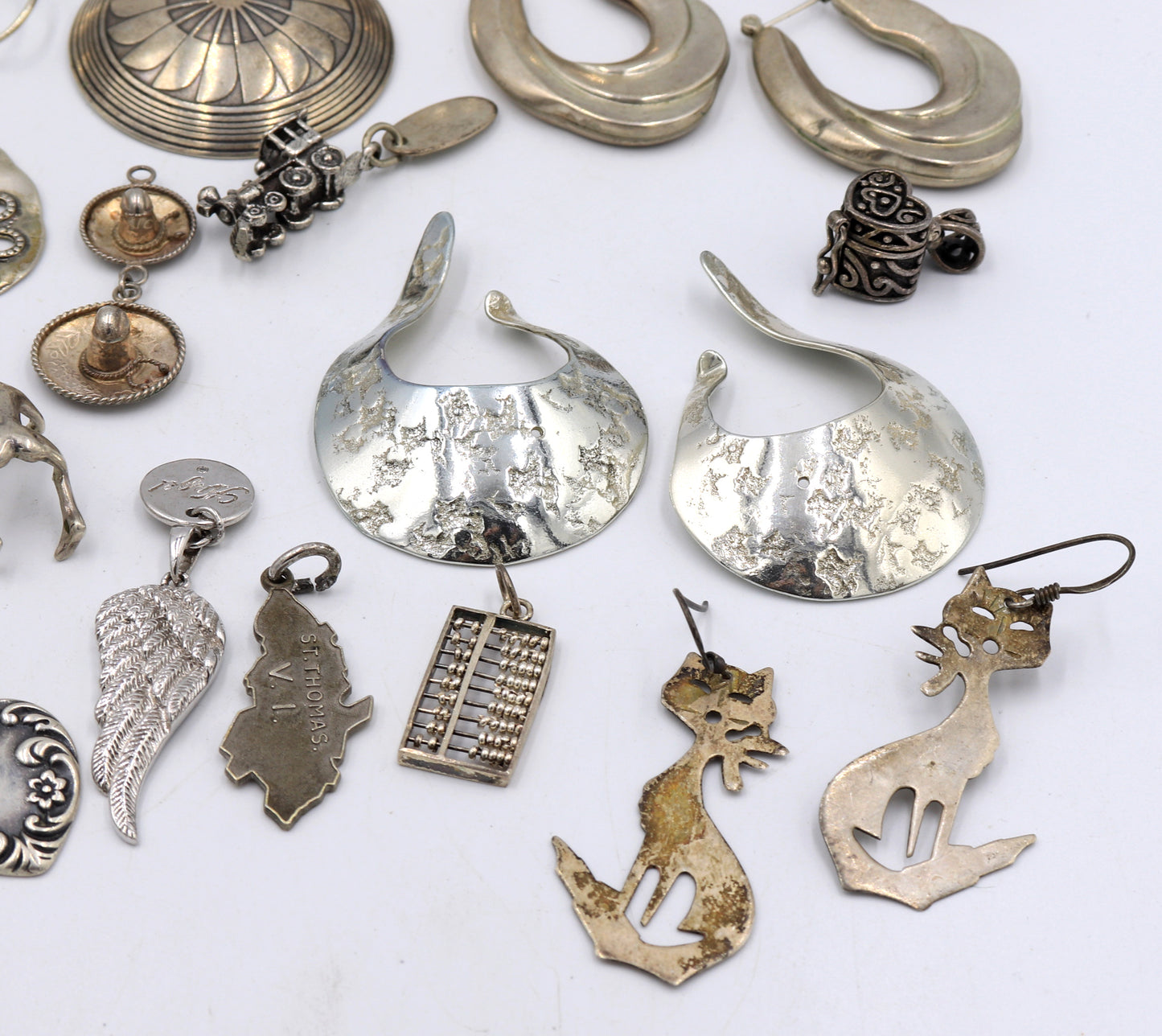 Group lot of Vintage 925 sterling silver charms and earrings
