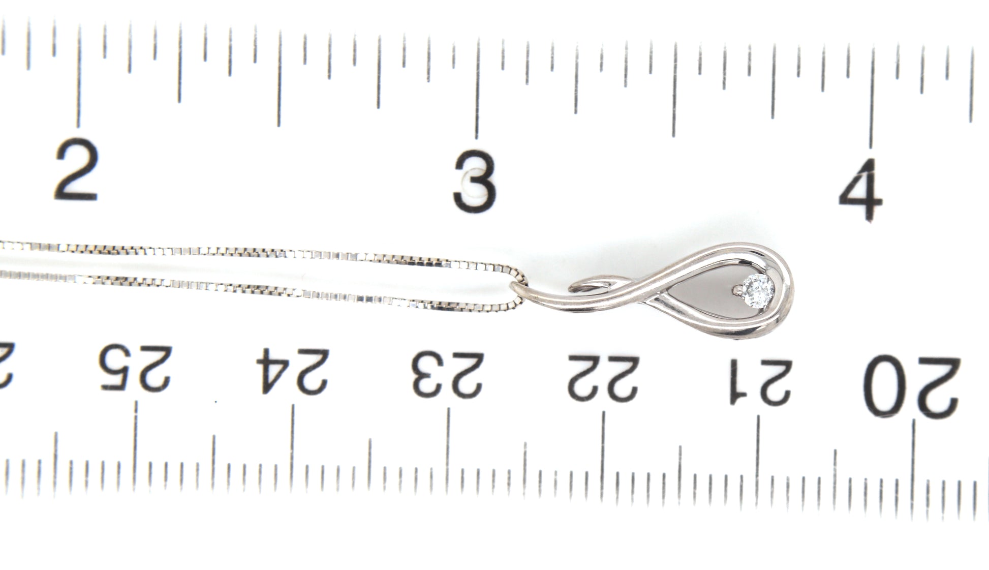 14kt White gold diamond pendant on chain