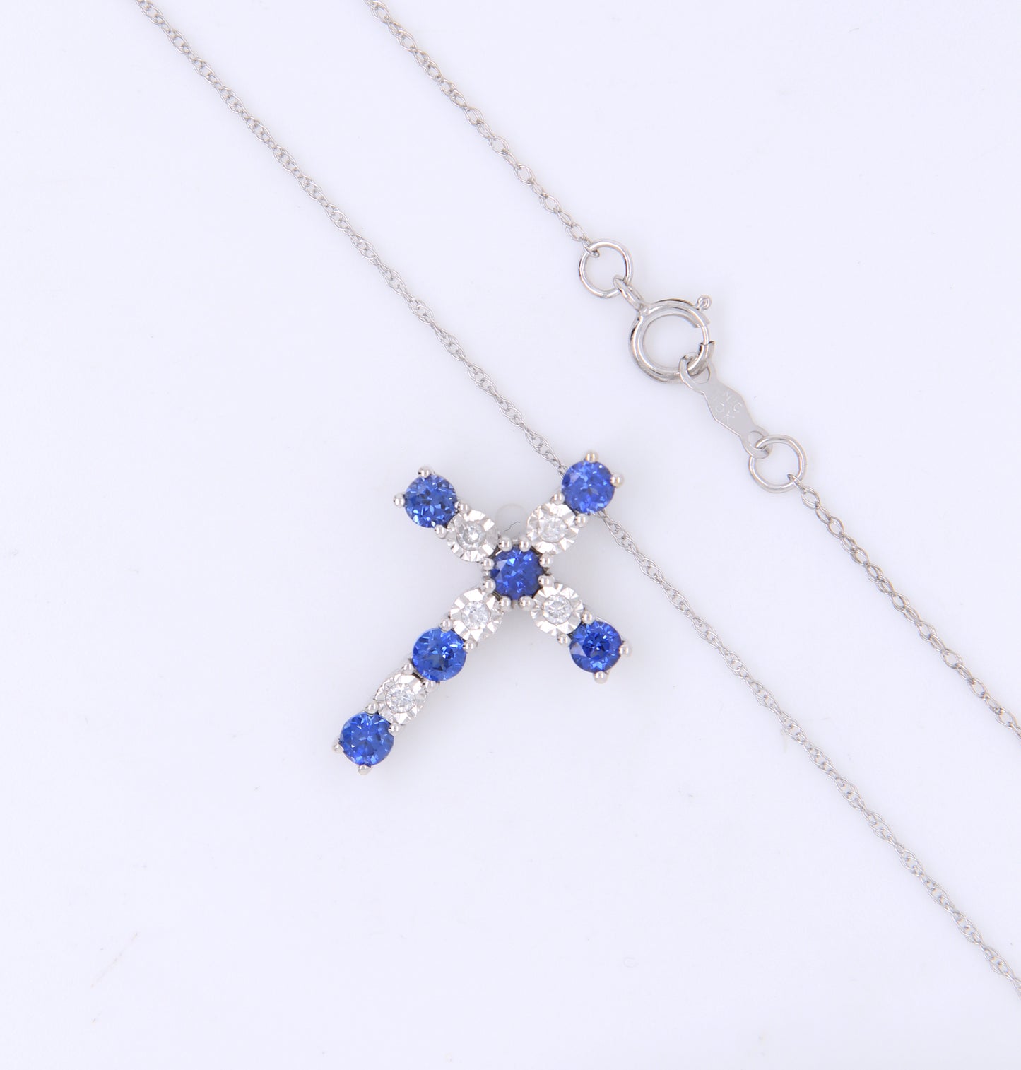 Fantastic White Gold Sapphire and Diamond accent Cross Pendant on Chain