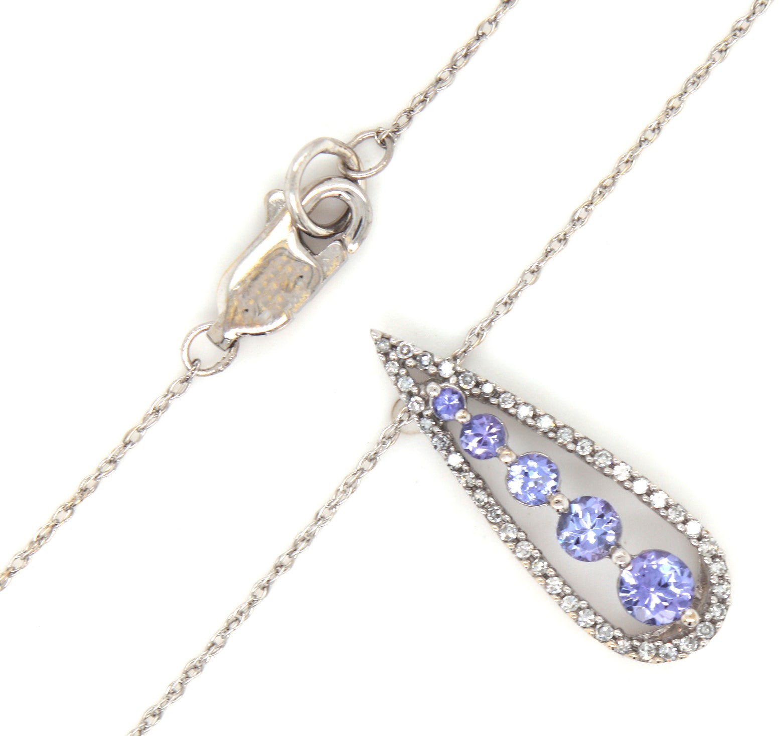 14kt White gold Tanzanite and diamond pendant on chain