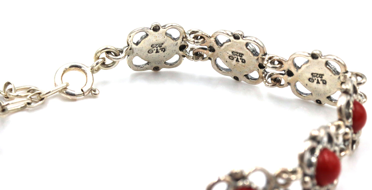 Set of 925 sterling silver signed gemstone bracelet and dangle earrings