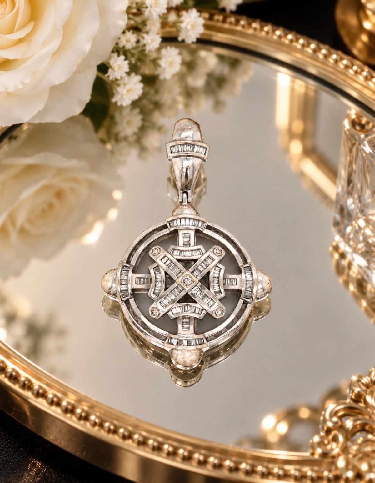 14kt White gold round brilliant and emerald cut diamond pendant