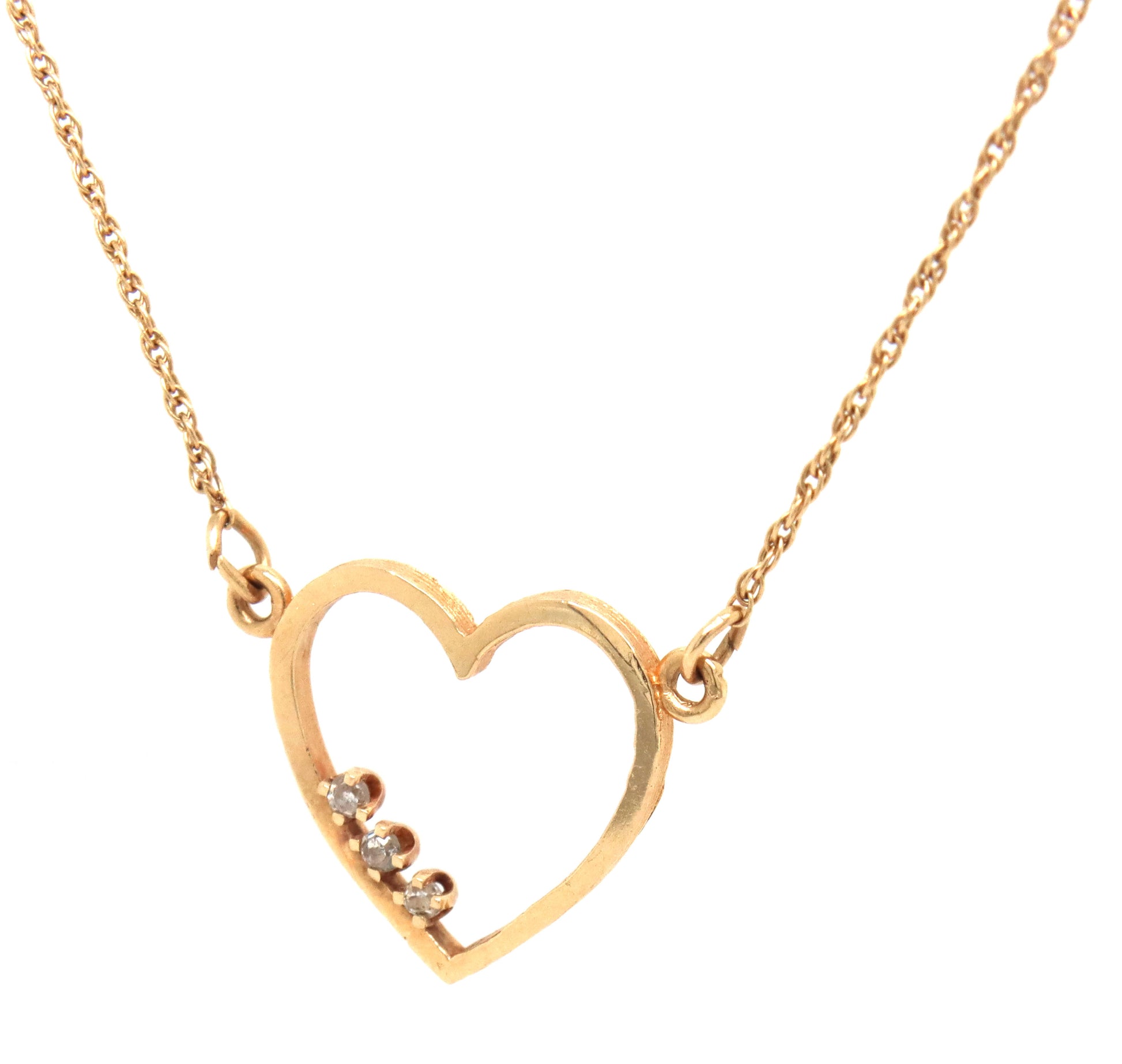 14kt Yellow gold heart shaped 3 stone diamond pendant on chain