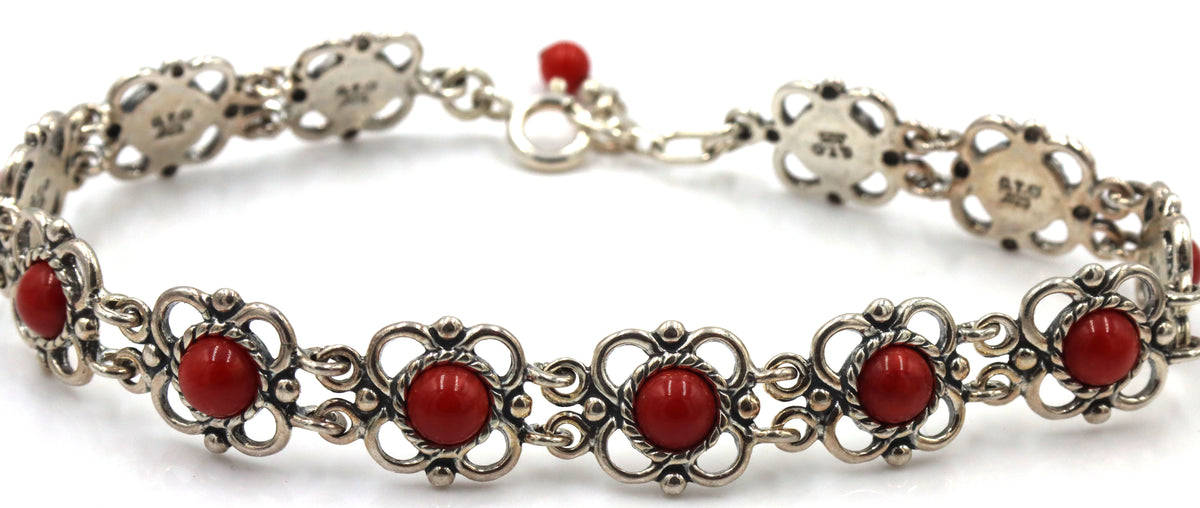 Set of 925 sterling silver signed gemstone bracelet and dangle earrings