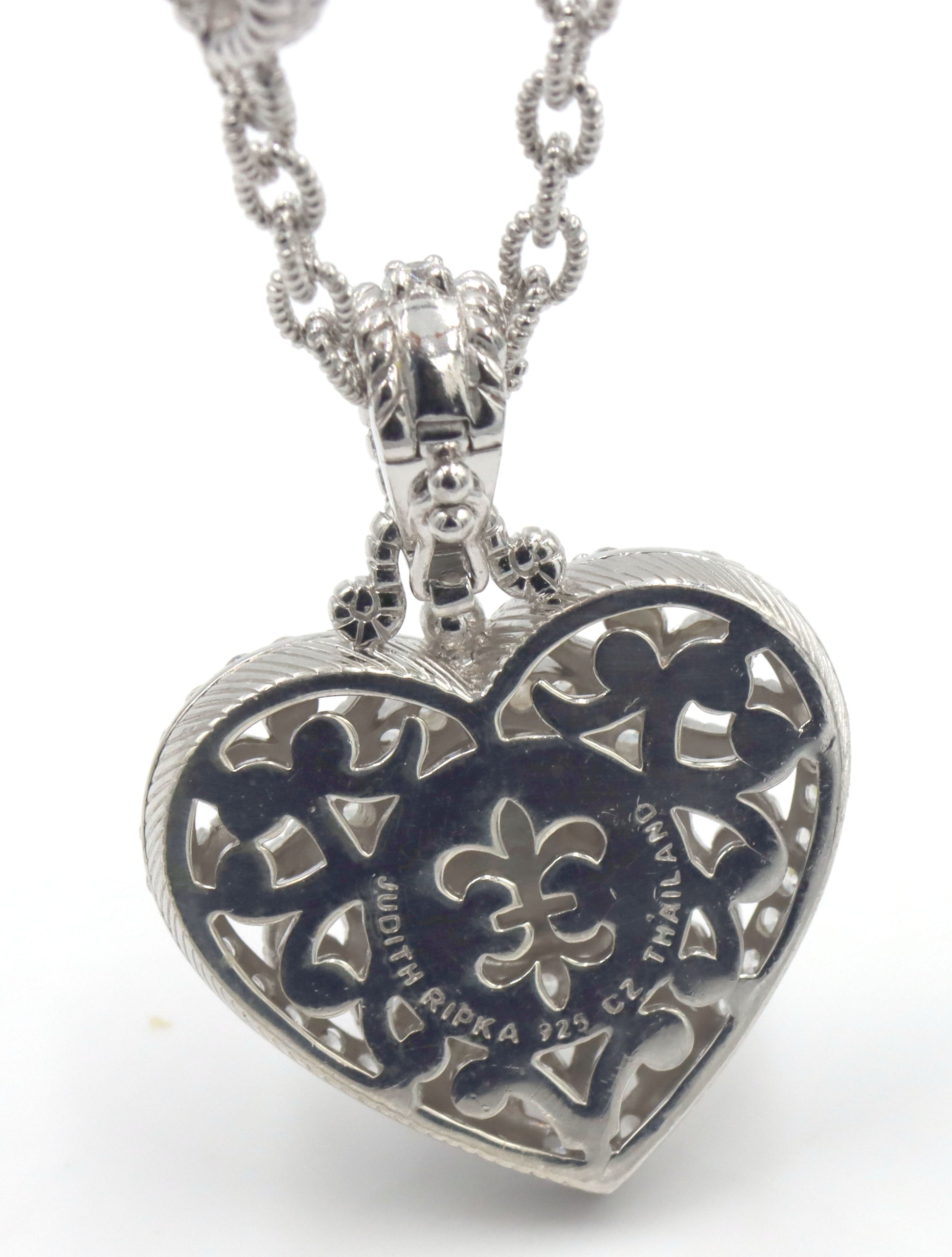 Judith Ripka silver heart station necklace with pink quartz heart enhancer